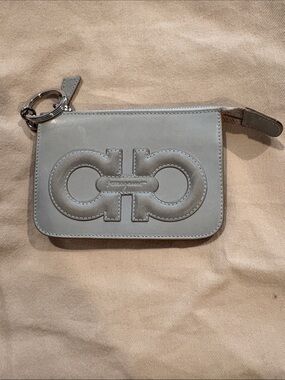 Salvatore Ferragamo light gray leather pouch with embossed logo keychain/coin